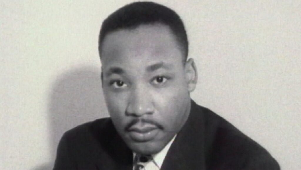 Black and white portrait of Martin Luther King Jr. MLK/FBI documentary.