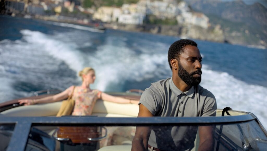 Tenet | Christopher Nolan John David Washington in Tenet on a boat. Christopher Nolan film scene.
