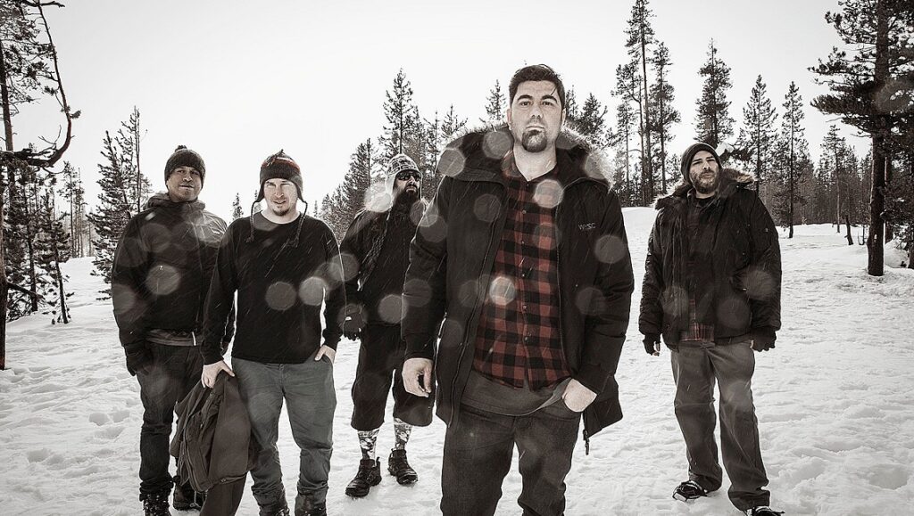 Deftones band portrait in snow. Ledger Line Q3 2020 issue featuring Deftones, Fleet Foxes, and Bright Eyes.
