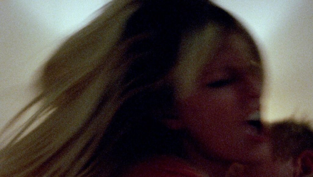 Slow Machine | Paul Felten & Joe DeNardo Slow Machine film still: Stephanie Hayes and Zach Weintraub in a close embrace.