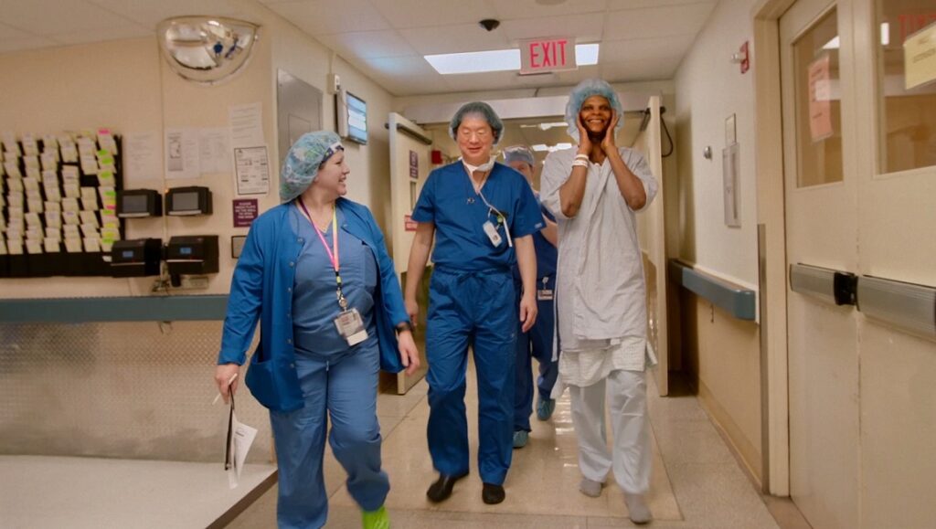 Dreamland: Medical staff in scrubs walk down a hospital hallway. Healthcare workers, doctors, and nurses.