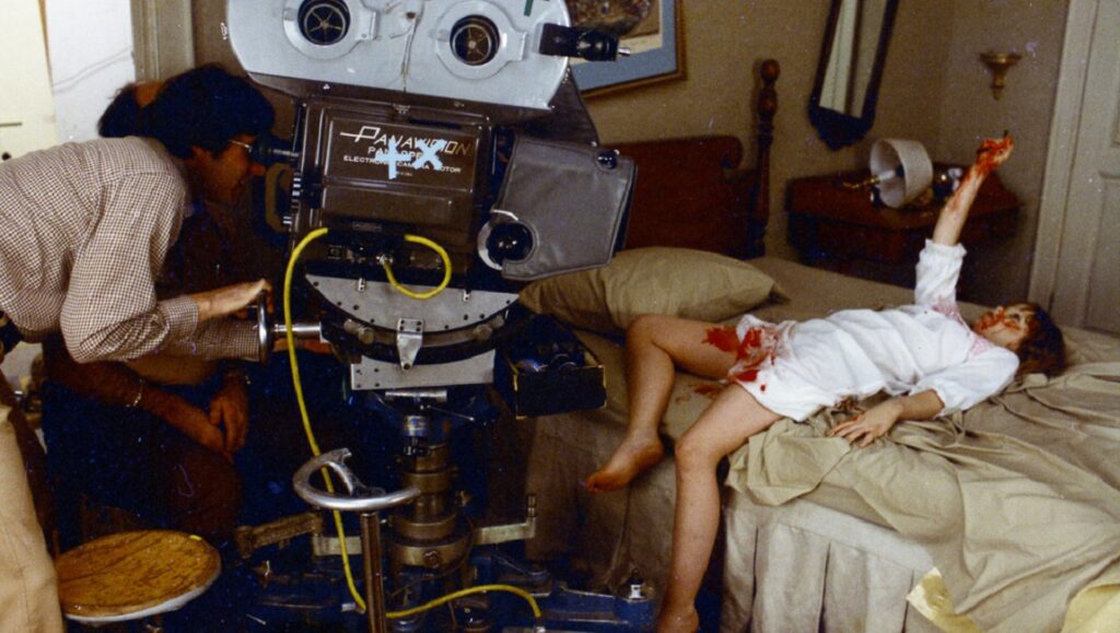 Leap of Faith: William Friedkin on The Exorcist | Alexandre O. Phillippe The Exorcist behind the scenes: William Friedkin directs a bloody scene with a Panavision camera. Horror film production.
