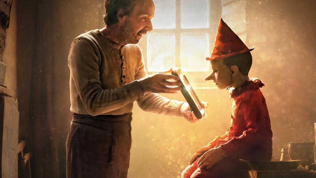 Pinocchio movie scene. Geppetto shows Pinocchio a picture frame.