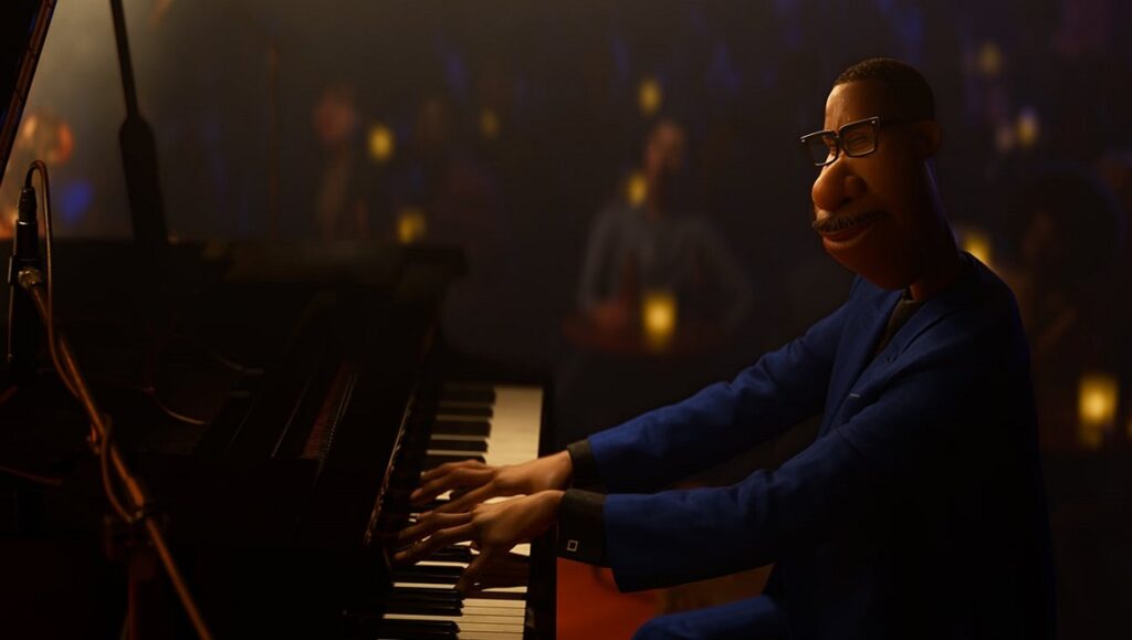 Soul | Pete Docter & Kemp Powers Joe Gardner plays piano in Disney Pixar's Soul. Animated jazz musician in blue suit.