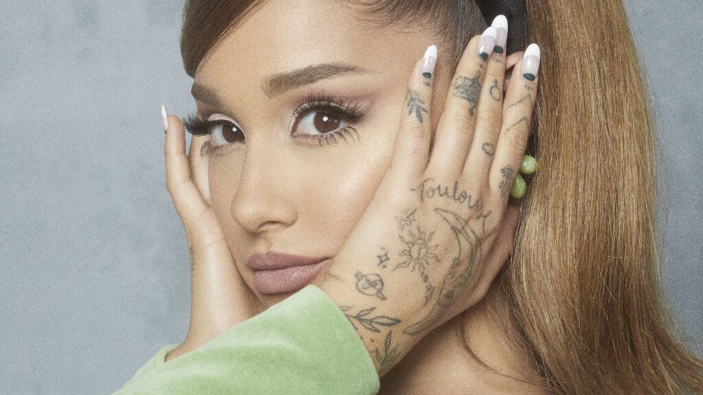 Album Roundup: Oct. – Dec. 2020 | Part 1: Ariana Grande, YG, Adrianne Lenker Ariana Grande album cover. Close-up of pop singer with tattoos and long nails. Music review.