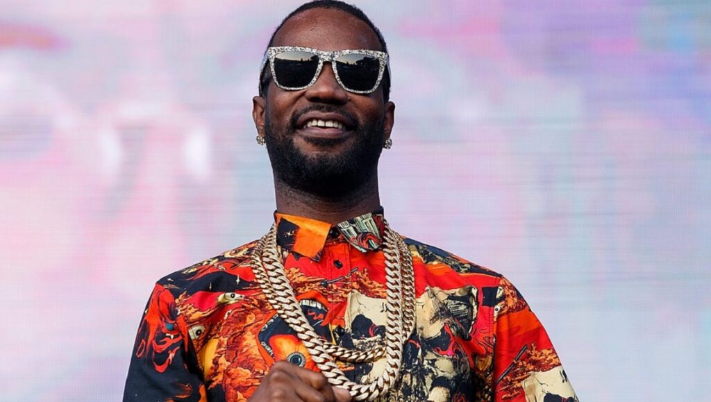 Juicy J. Rapper Juicy J with sunglasses and gold chain. Album Roundup: Oct. – Dec. 2020.