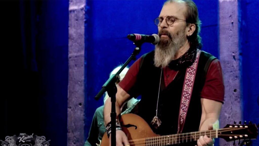 Steve Earle | J.T. Steve Earle performing Harlem River Blues on Jimmy Kimmel Live! Earle plays guitar and sings.