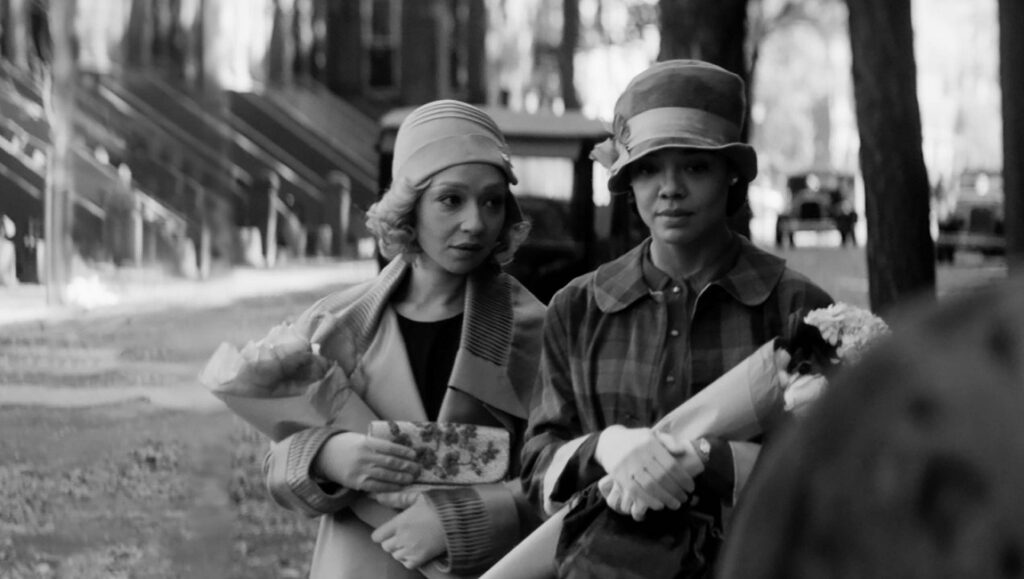 Black and white still from Passing featuring Ruth Negga and Tessa Thompson.
