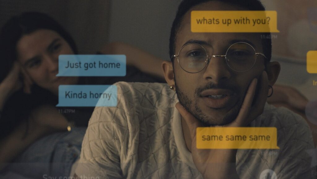 Searchers film still from Sundance Film Festival 2021. Couple texting.