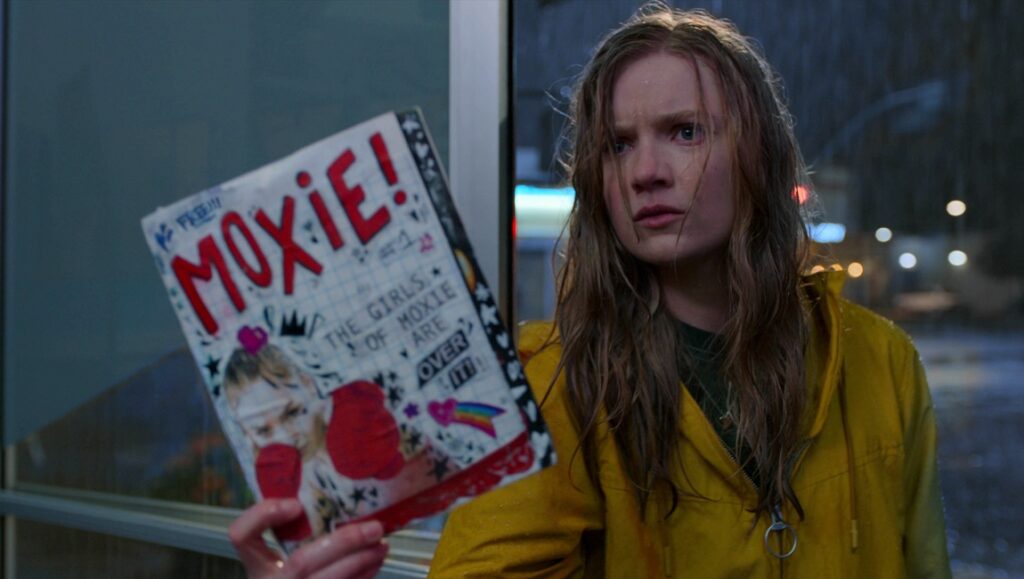 Moxie | Amy Poehler Girl holding Moxie! zine. Amy Poehler's Moxie movie scene. Teen feminism.