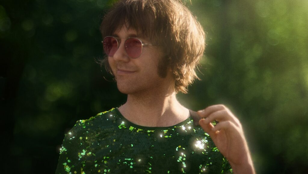 Aaron Lee Tasjan, February 2021 album. Singer with sunglasses and green sequin shirt. Album Roundup.
