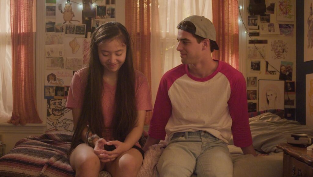 Inbetween Girl — Mei Makino I Was in Between at SXSW Film Festival. Teenagers on a bed. Coming-of-age movie scene.