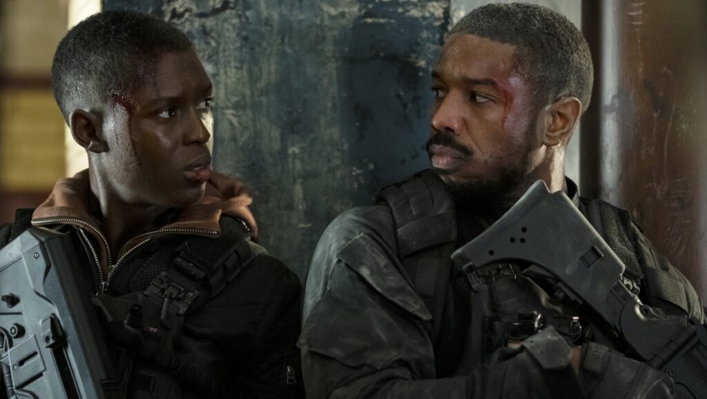 Tom Clancy’s Without Remorse | Stefano Sollima Michael B. Jordan in Tom Clancy's Without Remorse. Action movie scene with John Kelly holding a weapon.