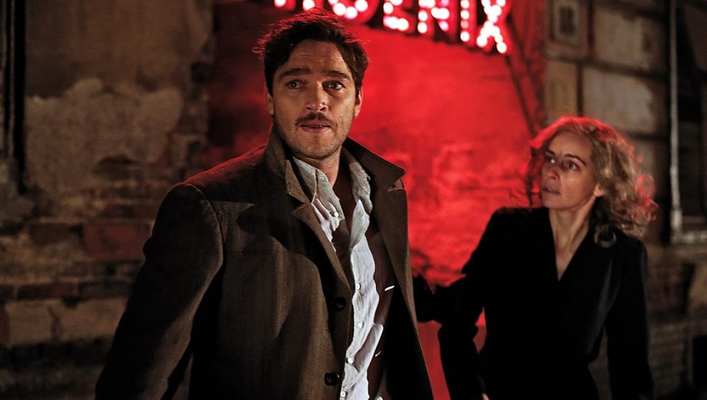 Phoenix | Christian Petzold Scene from the movie Phoenix. Nina Hoss and Ronald Zehrfeld in a dramatic pose. Film noir style.