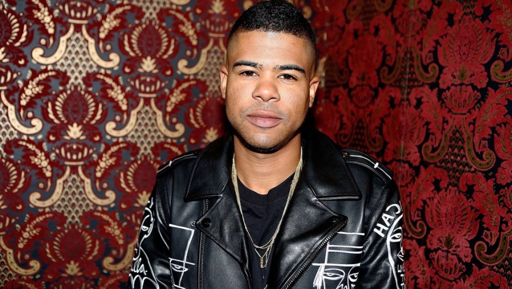 iLoveMakonnen | My Parade ILoveMakonnen portrait. Album Roundup May 2021. Rapper in leather jacket with gold chains. Music artist.