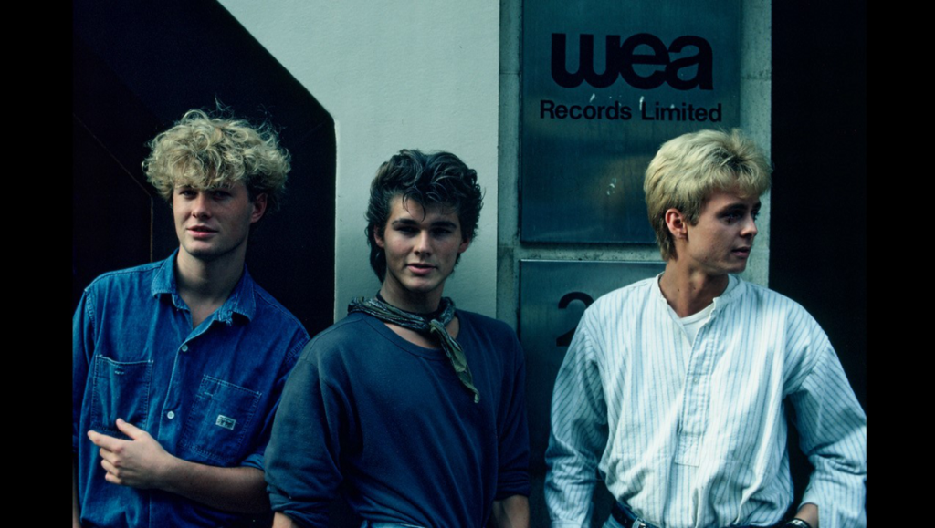A-ha band members. Morten Harket, Magne Furuholmen, and Paul Waaktaar-Savoy. 80s pop group. WEA Records.