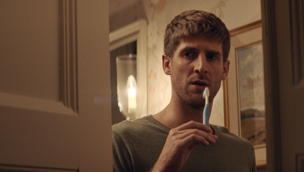 All My Friends Hate Me — Andrew Gaynord All My Friends Hate Me movie scene. Man with toothbrush in bathroom.