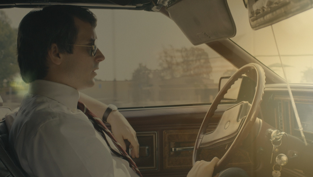 No Man of God | Amber Sealey Still from No Man of God film. Man driving a car. Amber Sealey film.