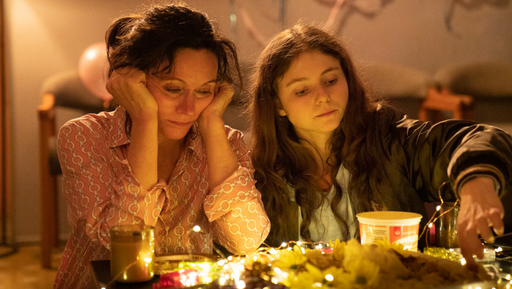 The Justice of Bunny King — Gaysorn Thavat The Justice of Bunny King film still: Gaysorn Thavat directs a scene with two women at a table.