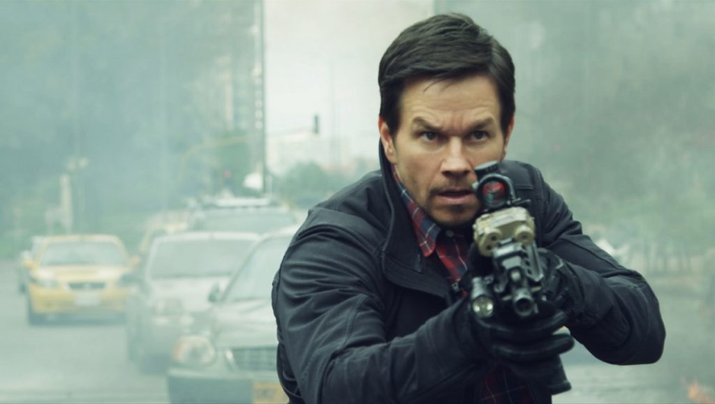 Infinite | Antoine Fuqua Mark Wahlberg in Infinite movie. Action scene with gun, intense look. Antoine Fuqua film.