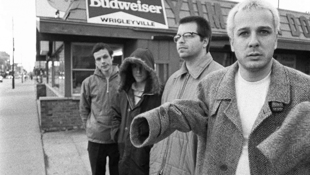 Weezer | Pinkerton Weezer's Pinkerton album era band photo. Black and white shot of Rivers Cuomo and bandmates outside a Wrigleyville bar.