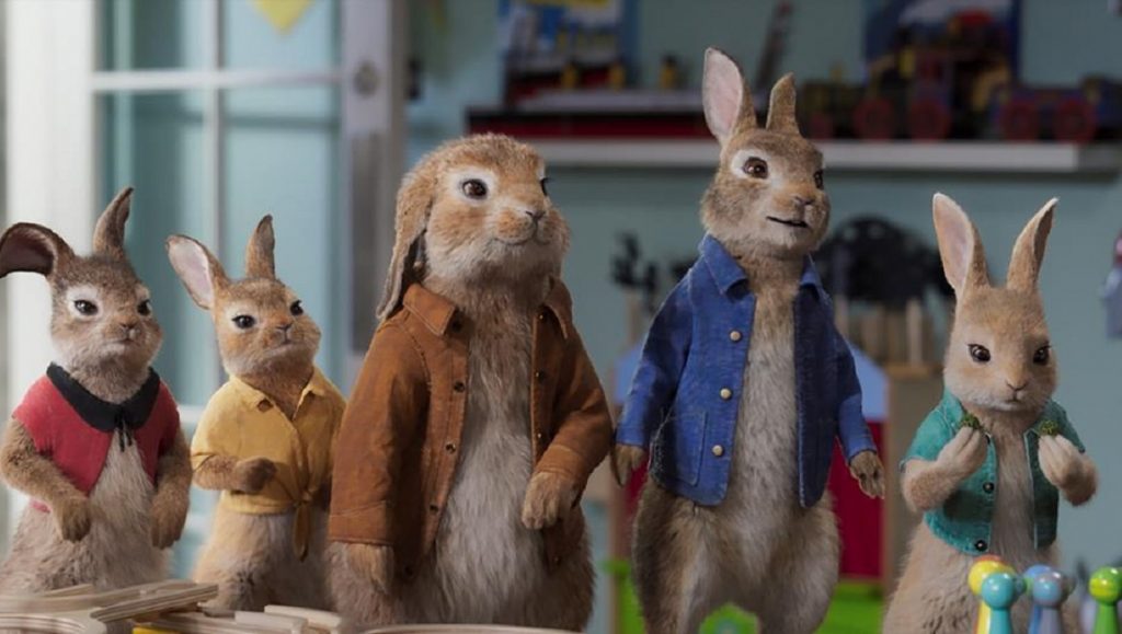 Peter Rabbit 2: The Runaway | Will Gluck Peter Rabbit 2: The Runaway movie still. Group of dressed rabbits. Will Gluck film.
