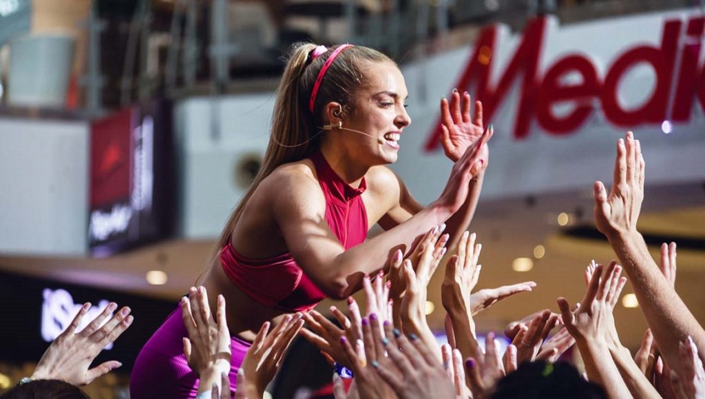 Sweat | Magnus von Horn Sweat movie image: Fitness influencer motivates crowd. Magnus von Horn film.