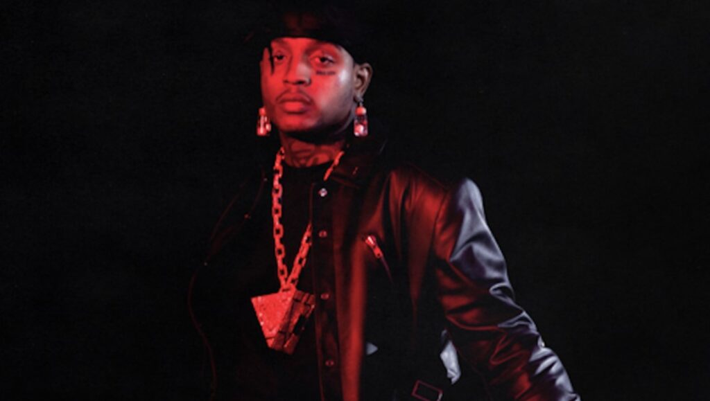 Ski Mask the Slump God | Sin City The Mixtape Portrait of rapper Ski Mask the Slump God with jewelry, leather jacket, and tattoos.