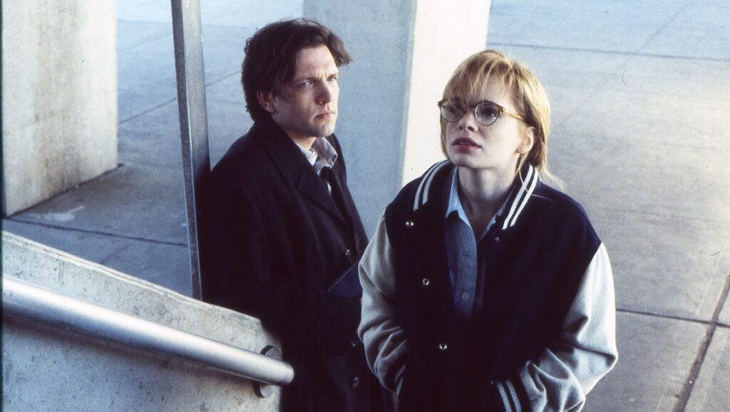 Still from Hal Hartley's Trust featuring Maria Pitillo and Martin Donovan. Indie film.