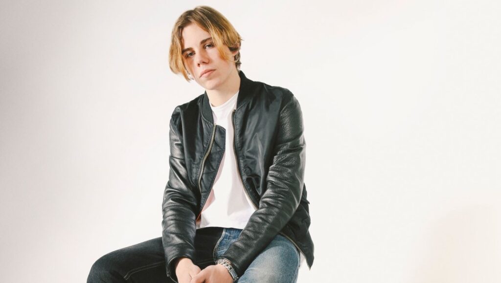 The Kid Laroi in July 2021. Album Roundup Part 1. Singer in black jacket and jeans. Music artist.