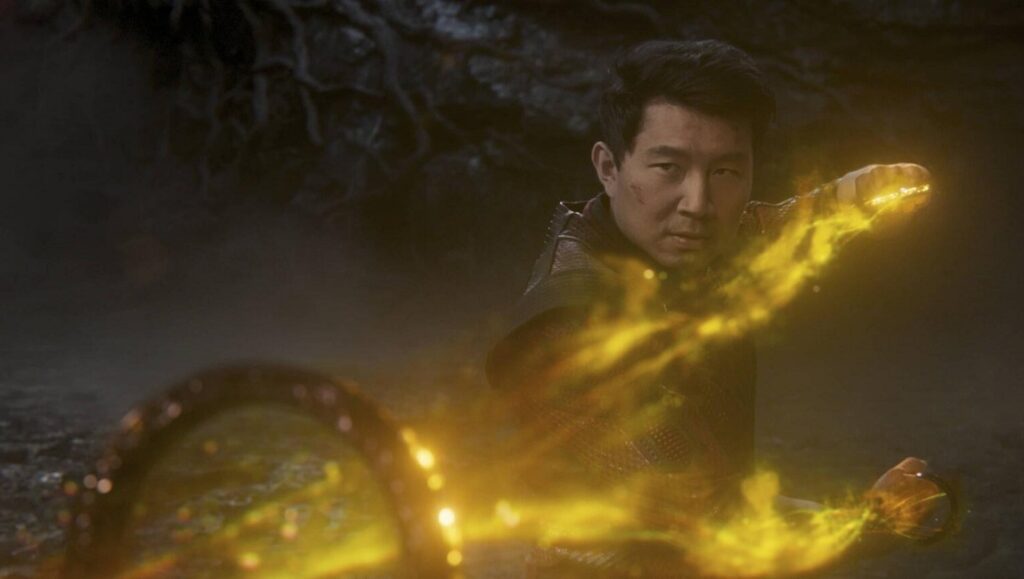 Shang-Chi and the Legend of the Ten Rings | Destin Daniel Cretton Simu Liu as Shang-Chi wielding the Ten Rings. Marvel's Shang-Chi and the Legend of the Ten Rings movie.