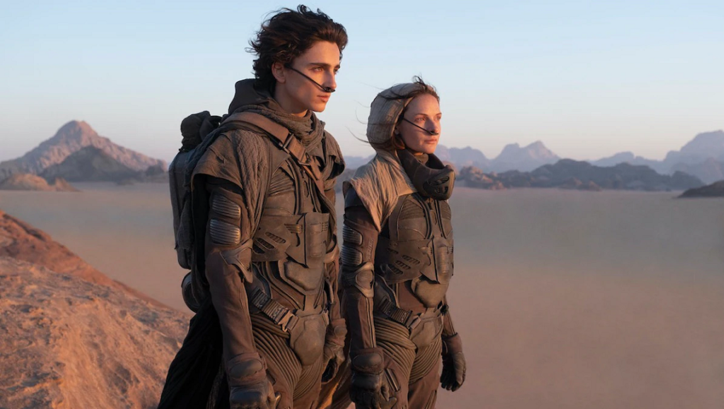 Dune | Denis Villeneuve Timothée Chalamet and Zendaya in Dune. The characters wear stillsuits.