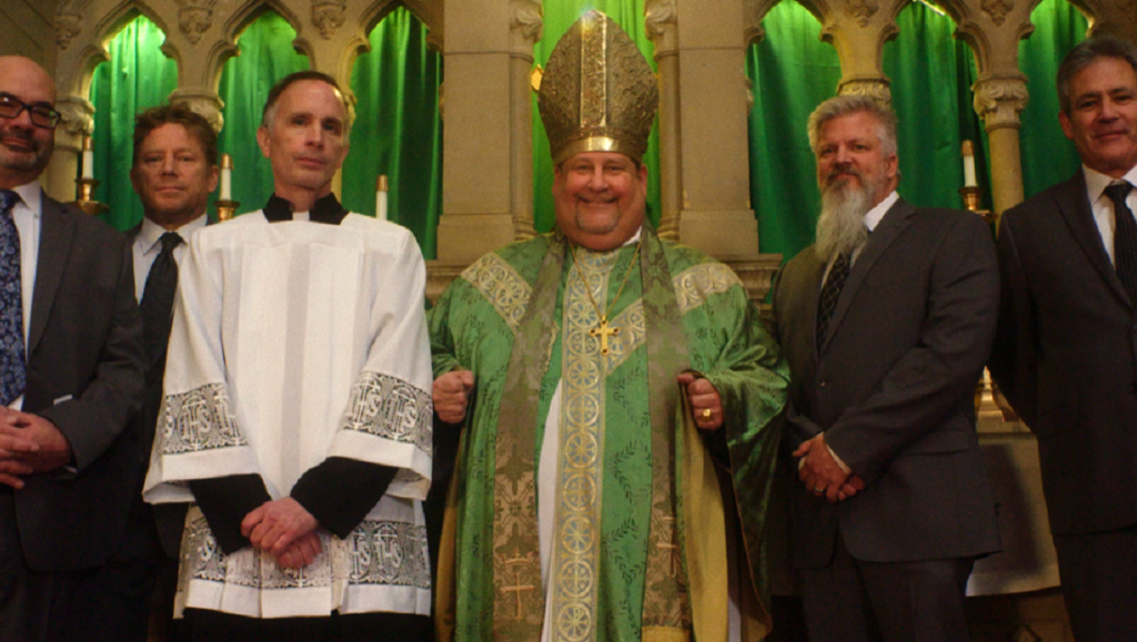 DOC NYC 2021 — Dispatch 4: Procession, The First Wave, Cusp Cast of Procession at DOC NYC 2021. Group of men including a bishop in green robes and miter. Documentary film.