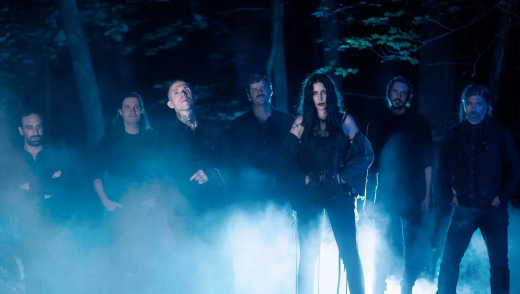 Album Roundup — November 2021 | Part 3: Converge/Chelsea Wolfe, Courtney Barnett, dltzk Chelsea Wolfe band promo shot. Dark, moody lighting with fog. Musical artist.