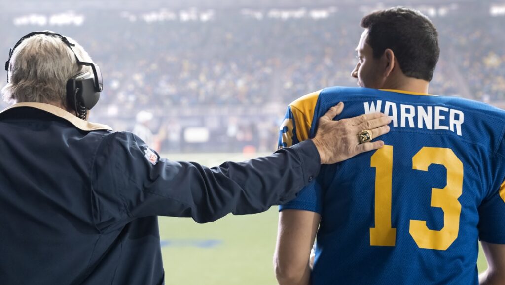 American Underdog | Jon Erwin & Andrew Erwin American Underdog movie scene. Coach with Kurt Warner #13. Football.