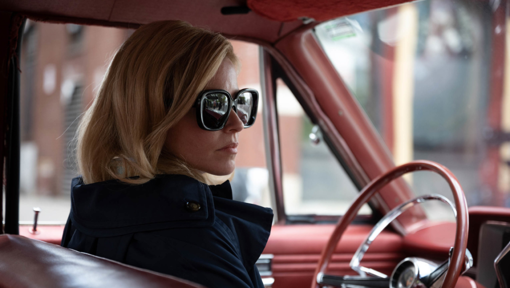Call Jane — Phyllis Nagy Elizabeth Banks in Call Jane at Sundance Film Festival 2022. Banks wears sunglasses in a red car.