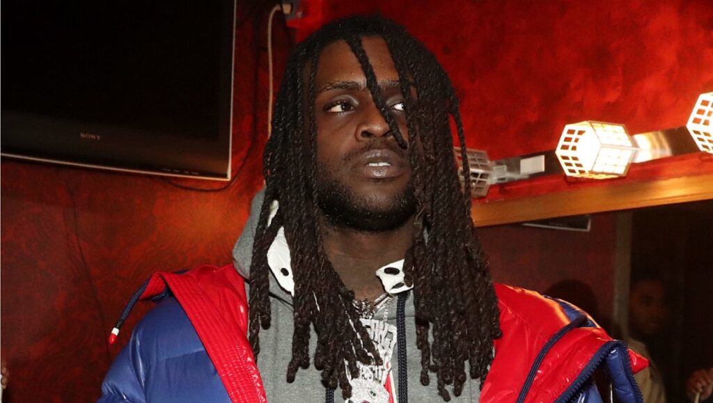 Album Roundup — December 2021: Chief Keef, Rick Ross, Roddy Ricch Chief Keef, December 2021 album roundup. Rapper with dreadlocks, wearing a gray hoodie and red and blue jacket.