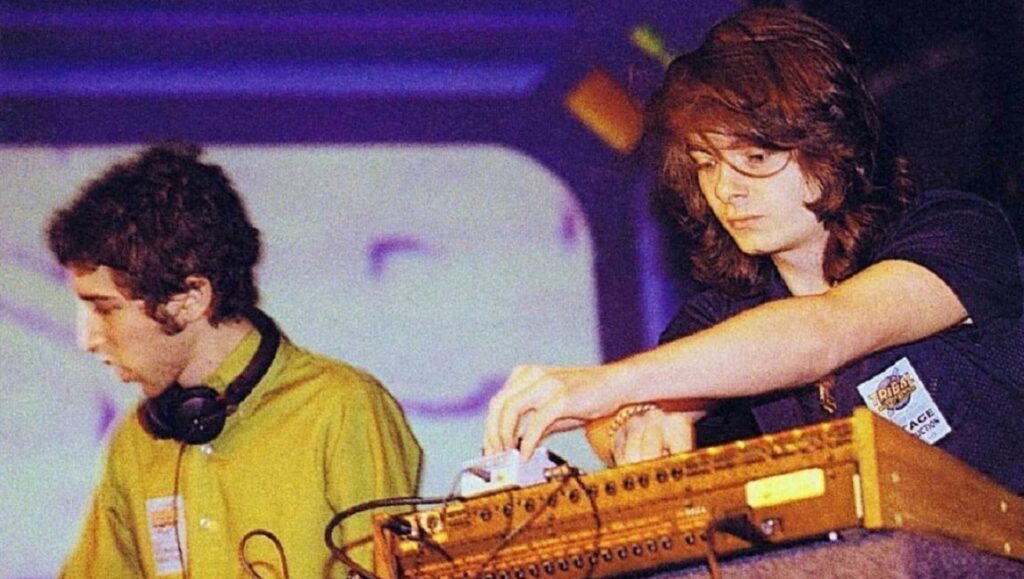 Daft Punk performing live during the Homework era. Electronic music duo with synthesizer.