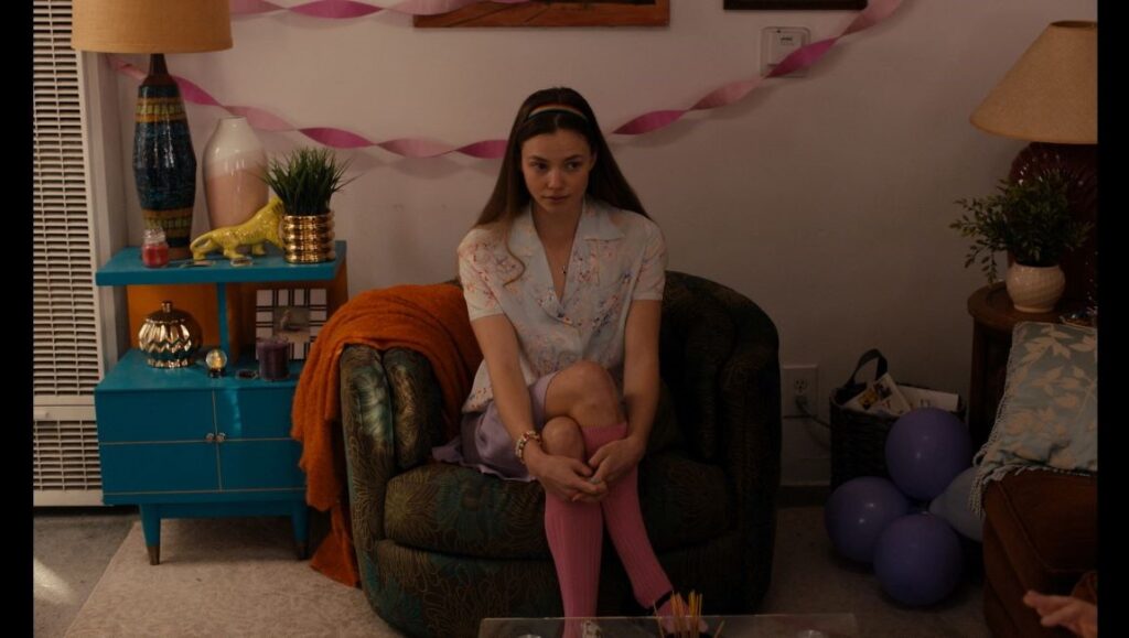 Sundance Film Festival 2022 — Dispatch 2: Sharp Stick, When You Finish Saving the World, Brainwashed Still from Sharp Stick at Sundance Film Festival 2022. Lena Dunham film with Kristine Froseth. Woman in chair.