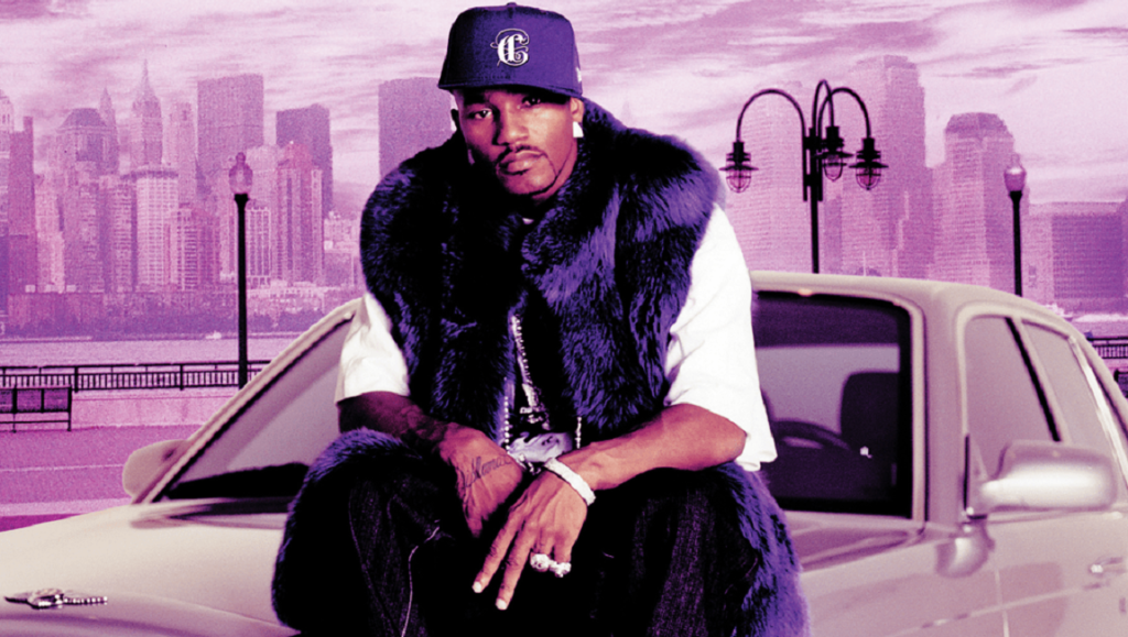 Cam'ron Purple Haze album cover. Rapper in purple fur vest and hat, posing on a car with a city skyline backdrop.