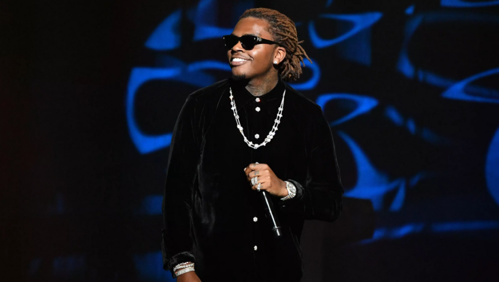 Album Roundup — January 2022 | Part 1: Gunna, The Lumineers, Brent Cobb Gunna, January 2022 album roundup. Rapper with sunglasses and jewelry. New music.