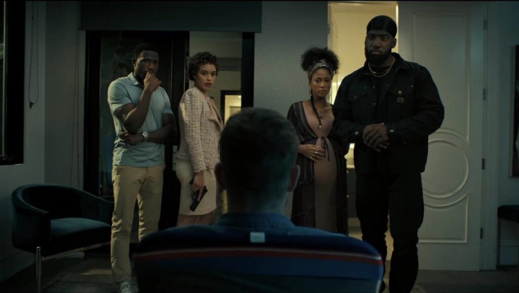 A Lot of Nothing — Mo McRae Scene from A Lot of Nothing at SXSW Film Festival. Four people stand over a seated man, one holding a gun.