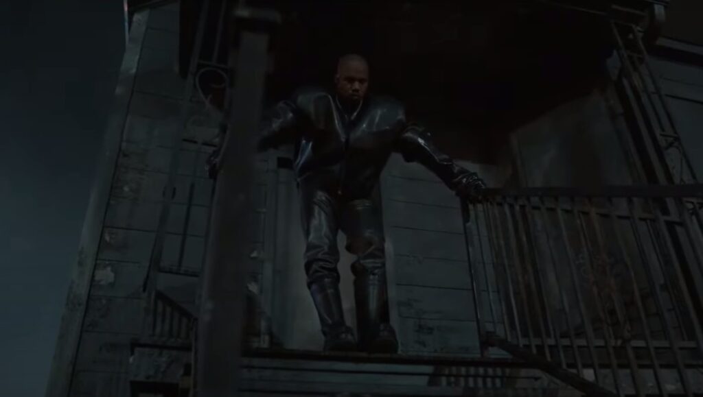 Kanye West — Donda 2 (V2.22.22 Miami) Kanye West in February 2022. Rapper in dark clothing on a porch. New music album roundup.