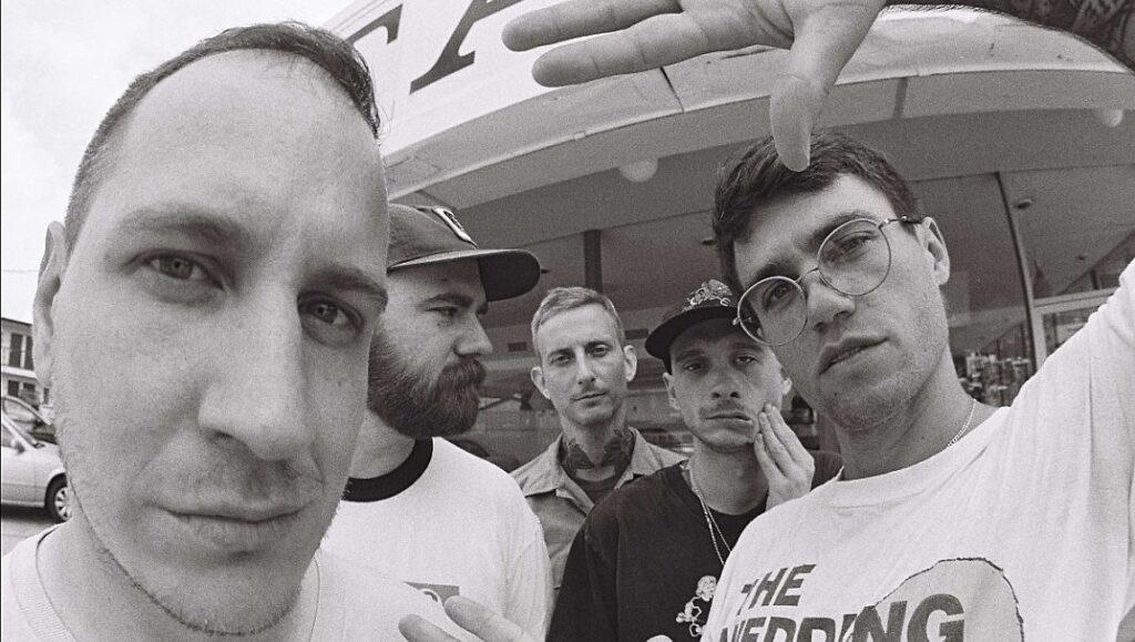 Drug Church — Hygiene Drug Church band promo. Album Roundup: March 2022, Part 1. Black and white portrait.