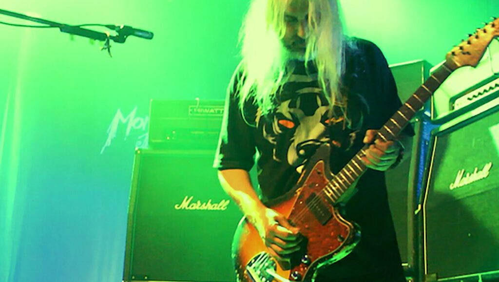 Freakscene: The Story of Dinosaur Jr. — Philipp Virus J Mascis of Dinosaur Jr. plays guitar at a live Freakscene concert.