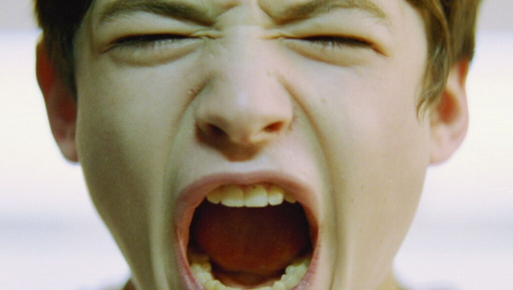 Afterschool — Antonio Campos Close-up of Ezra Miller screaming in Afterschool by Antonio Campos. Intense emotion, teen angst.