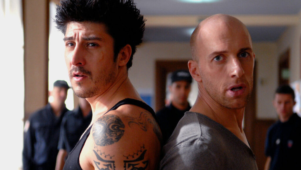 David Belle and Cyril Raffaelli in District 13. Action movie stars. Martial arts film.