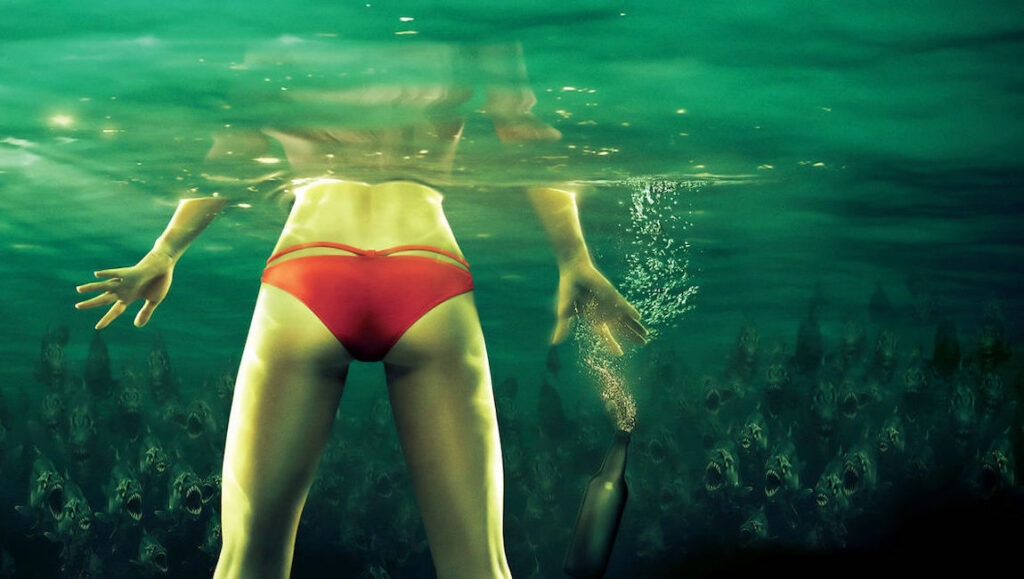 Piranha 3-D — Alexandre Aja Woman in bikini underwater with piranhas. Horror movie scene. Piranha 3D.