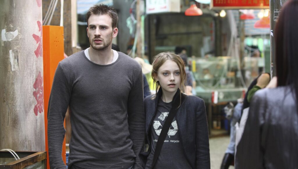 Push — Paul McGuigan Chris Evans and Dakota Fanning in Push movie. Sci-fi thriller film scene. Actors on set.