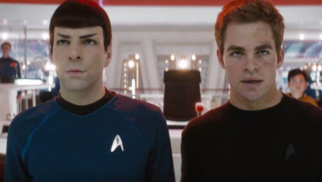 Star Trek movie scene: Spock and Kirk on the bridge. Zachary Quinto as Spock, Chris Pine as Kirk. Sci-fi film.
